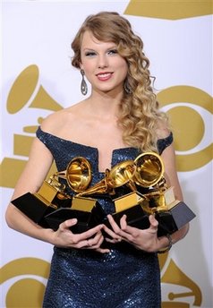 Grammy Awards Show who helped her pick the fallen plaque? Kanye?
