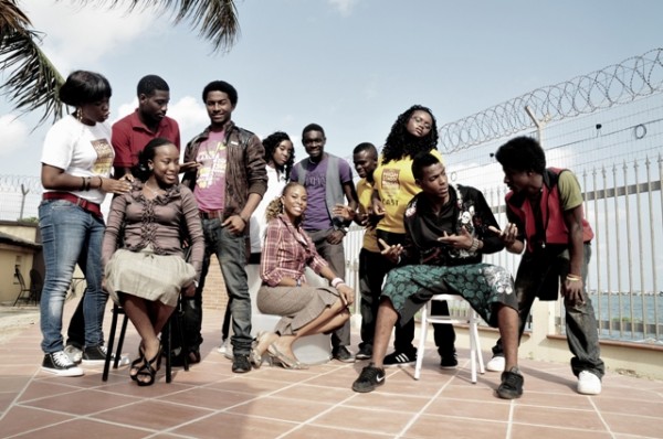 troy and gab pose with other cats members