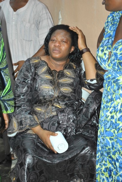 One of his wives weeps uncontrollably