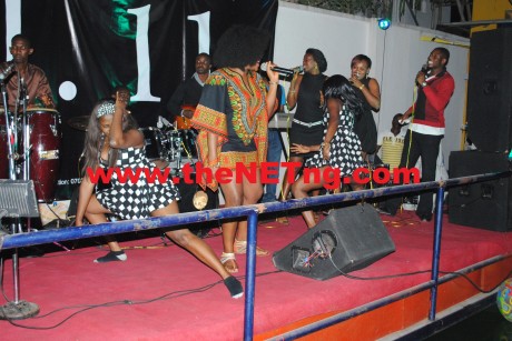 On stage with her band and dancers