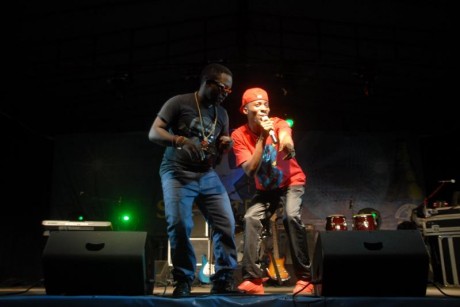 M.I, performing with one of his fans, Jekky B,